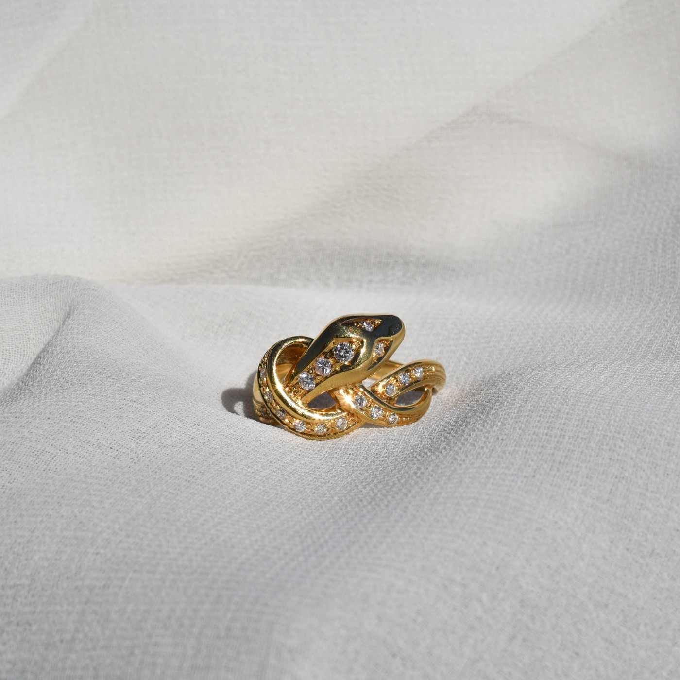 Anello serpente in oro giallo e brillanti