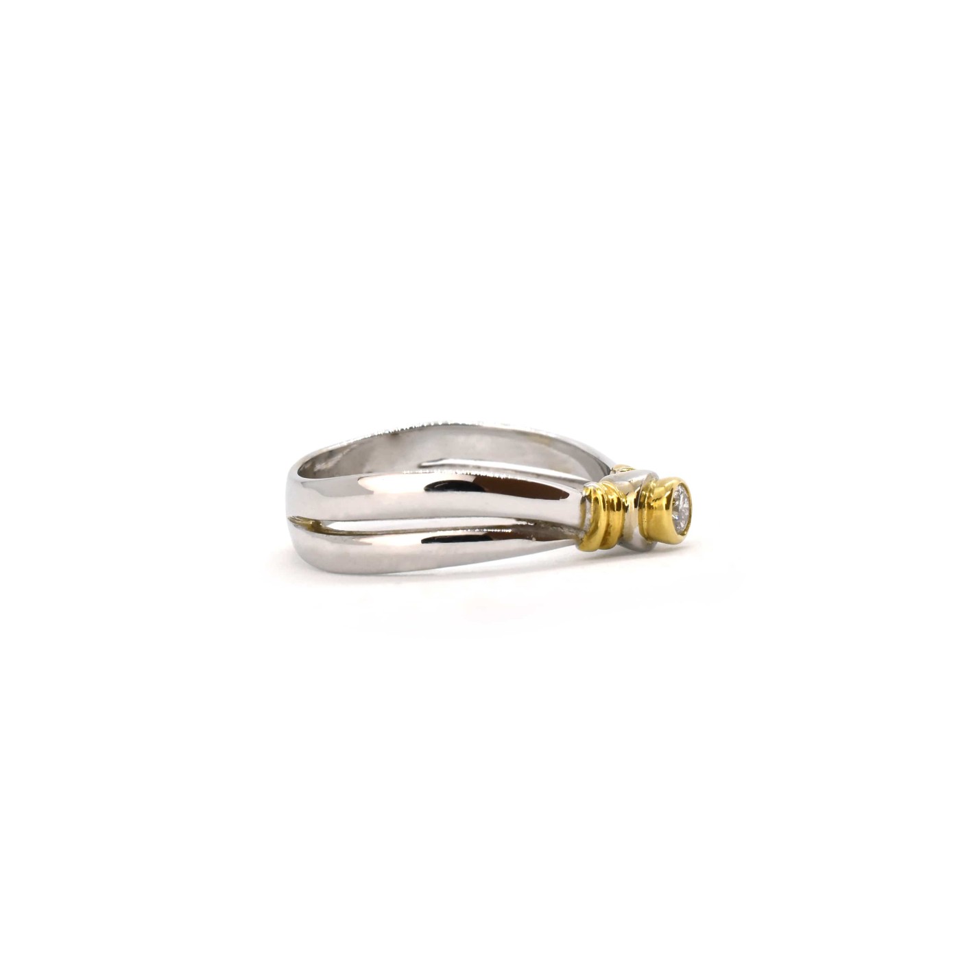 Anello solitario oro bianco e giallo diamante 0,10 ct