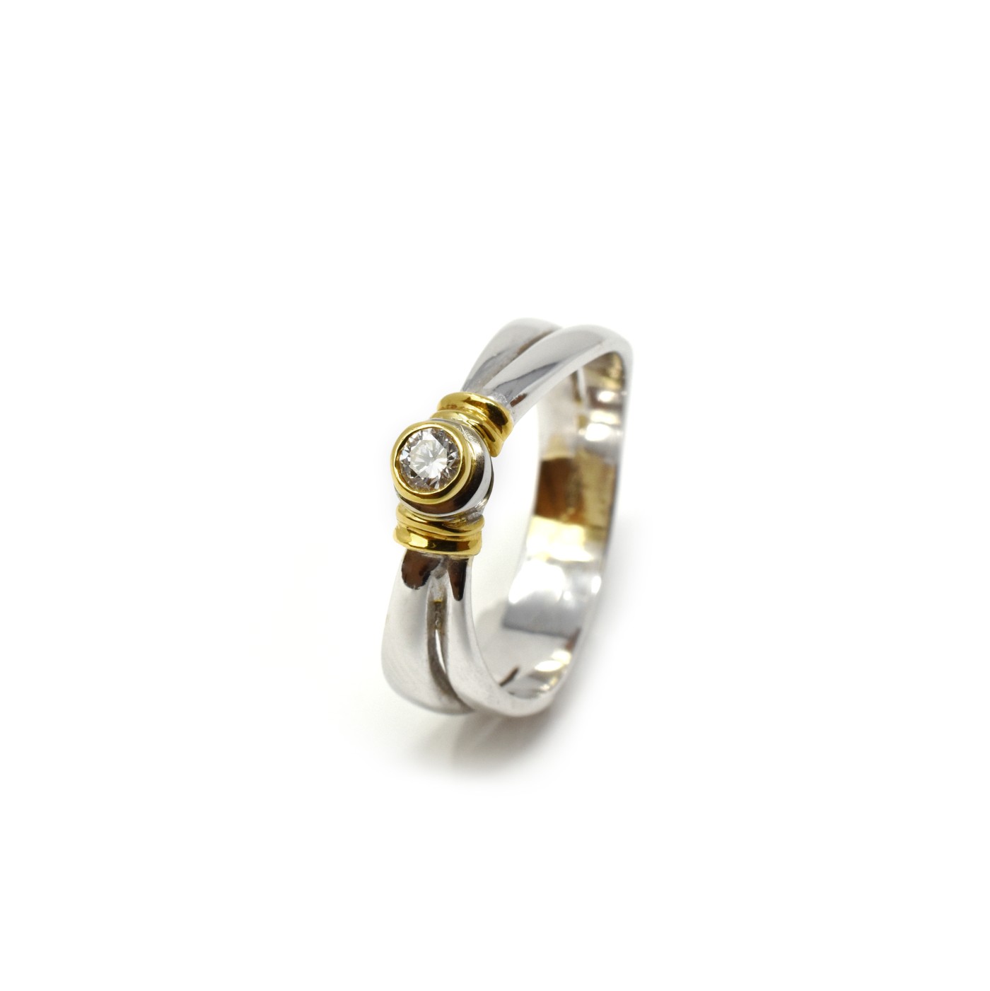 Anello solitario oro bianco e giallo diamante 0,10 ct