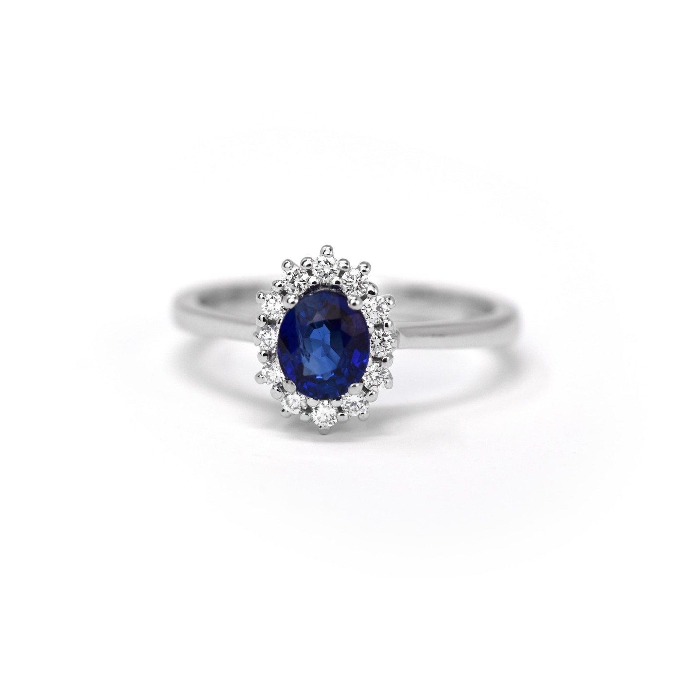 Anello in oro bianco con Zaffiro e diamanti 0,16 ct.
