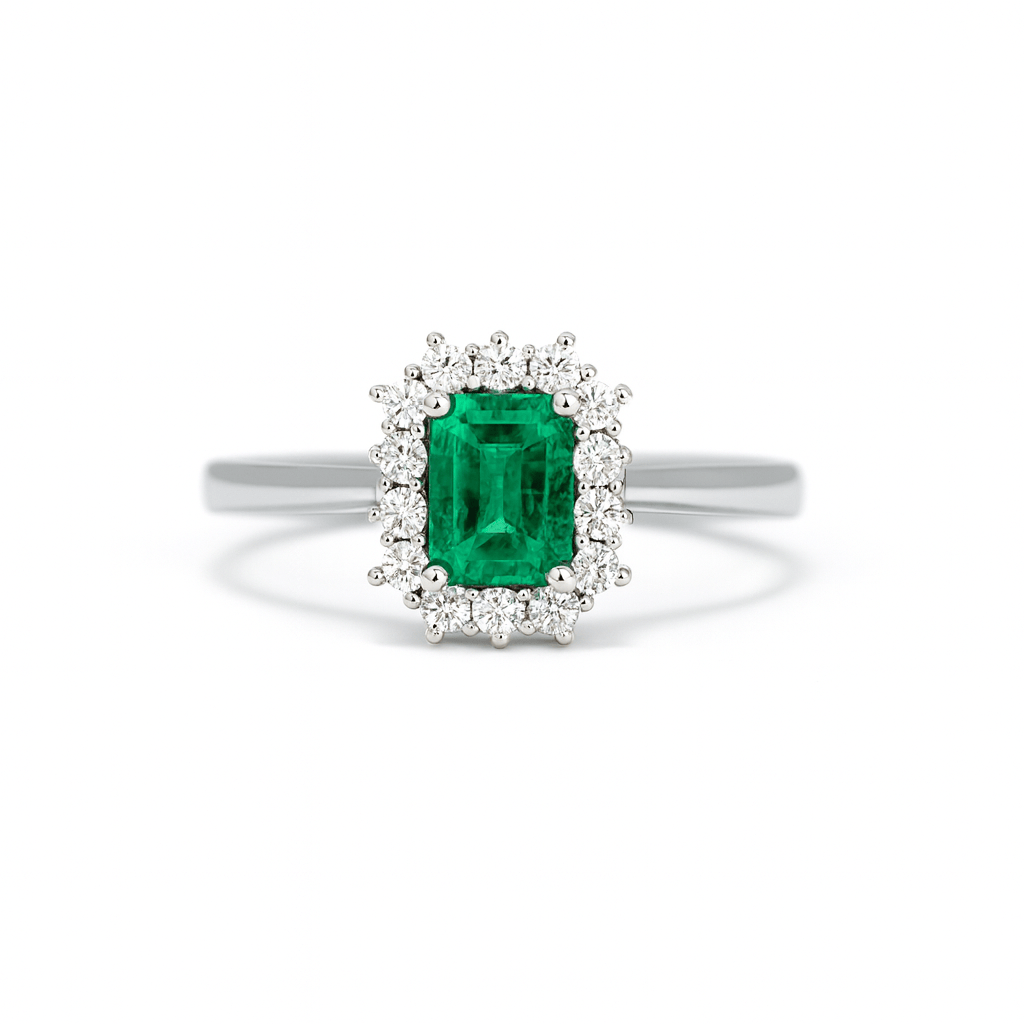 Anello in oro bianco con Smeraldo e diamanti 0,18 ct.
