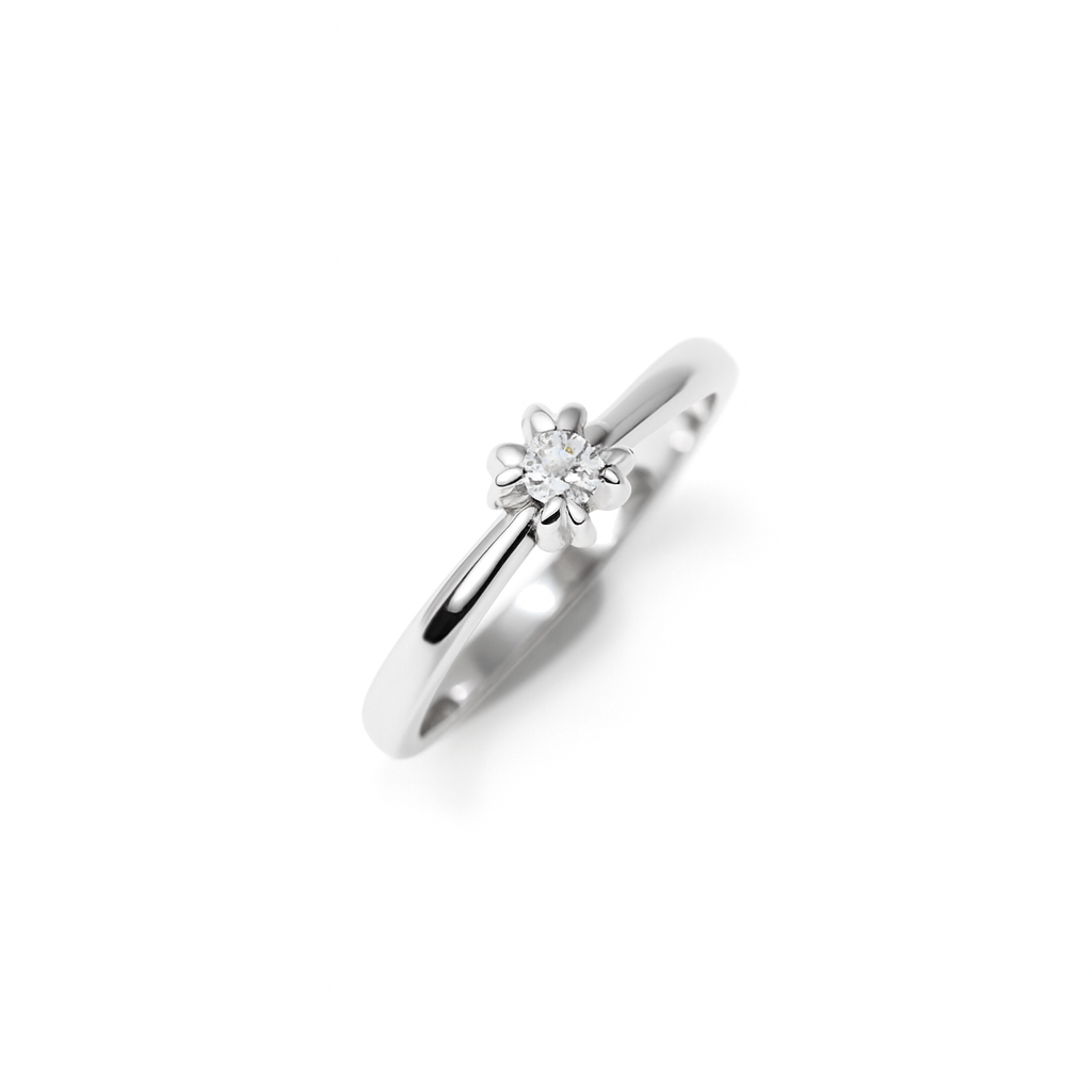 Anello solitario con brillante da 0,05 ct.