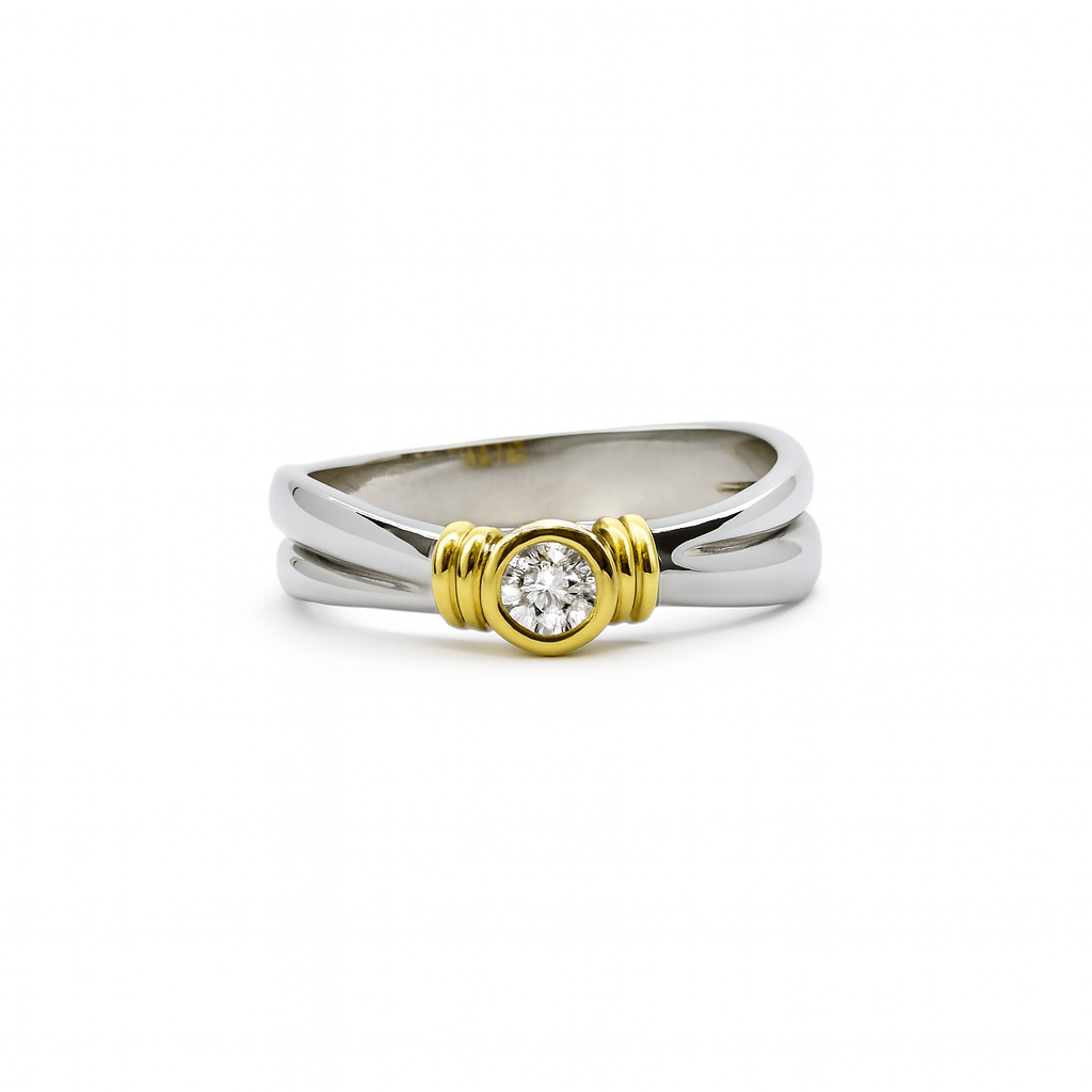 Anello solitario oro bianco e giallo diamante 0,10 ct