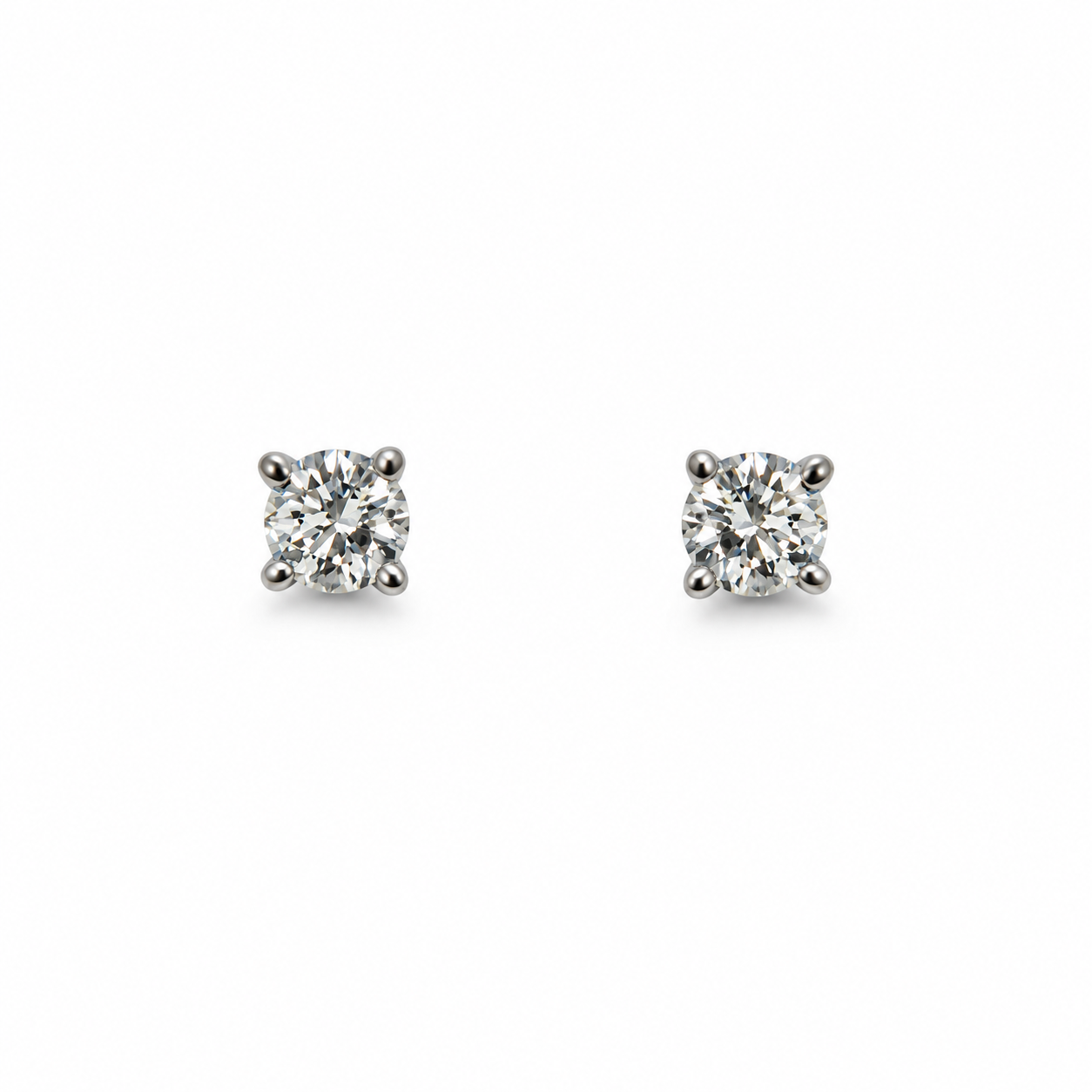 Orecchini punto luce oro bianco e diamanti 0,44 ct